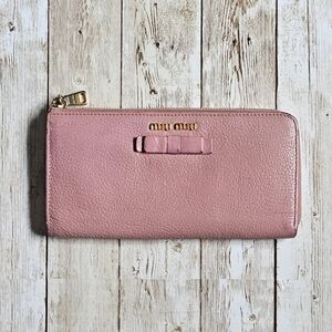 Miu Miu Pink Wallet with Elegant Zip Closure